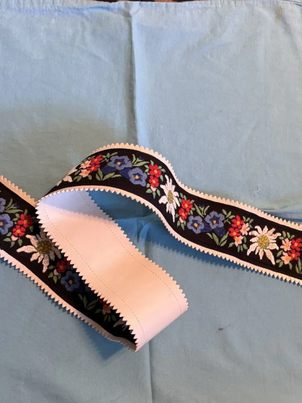 Wide Black Womens' Belt with Embroidered Stylized Flowers and Silver Buckle